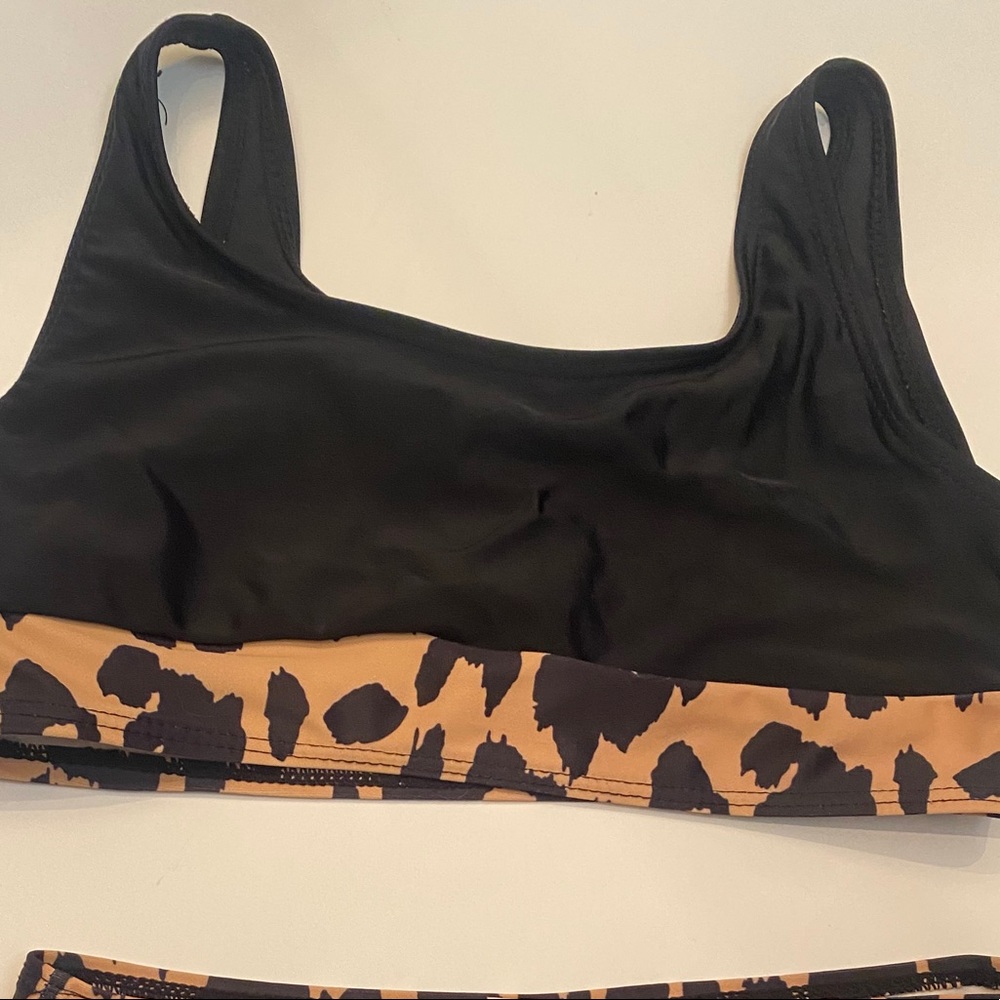 Black cheetah swim